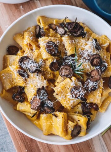 Butternut Squash and Roasted Garlic Pasta topped with Crispy Mushrooms