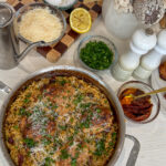 Creamy Lemon Chicken Thighs with Sun-Dried Tomato Orzo. Golden seared chicken thighs nestled in creamy lemon sauce with sun-dried tomato orzo, garnished with fresh herbs